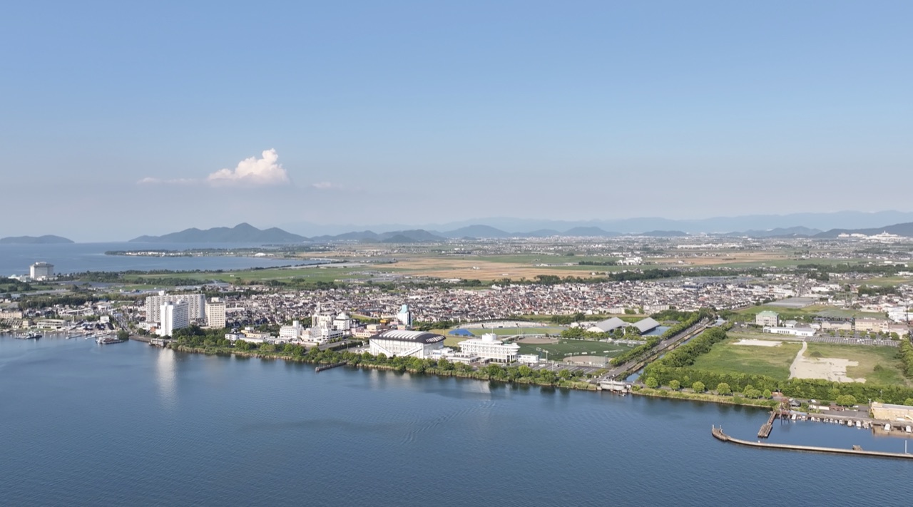 Lake Biwa and the Shiga countryside from above — the broader landscape of the Kyoto-to-Shiga day trip
